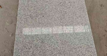 贵港芝麻白光面毛板