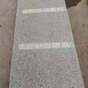 贵港芝麻白光面毛板