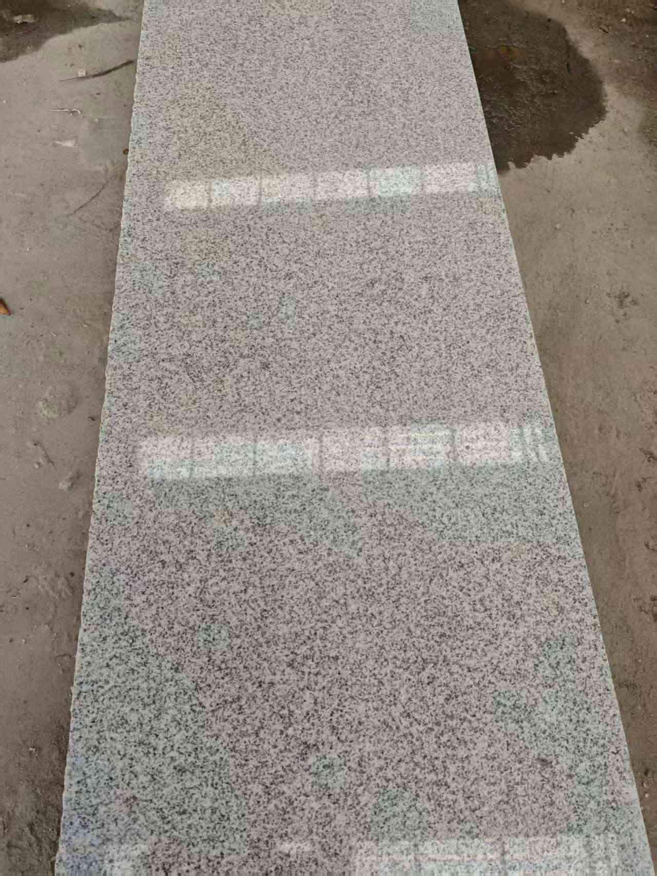 贵港芝麻白光面毛板